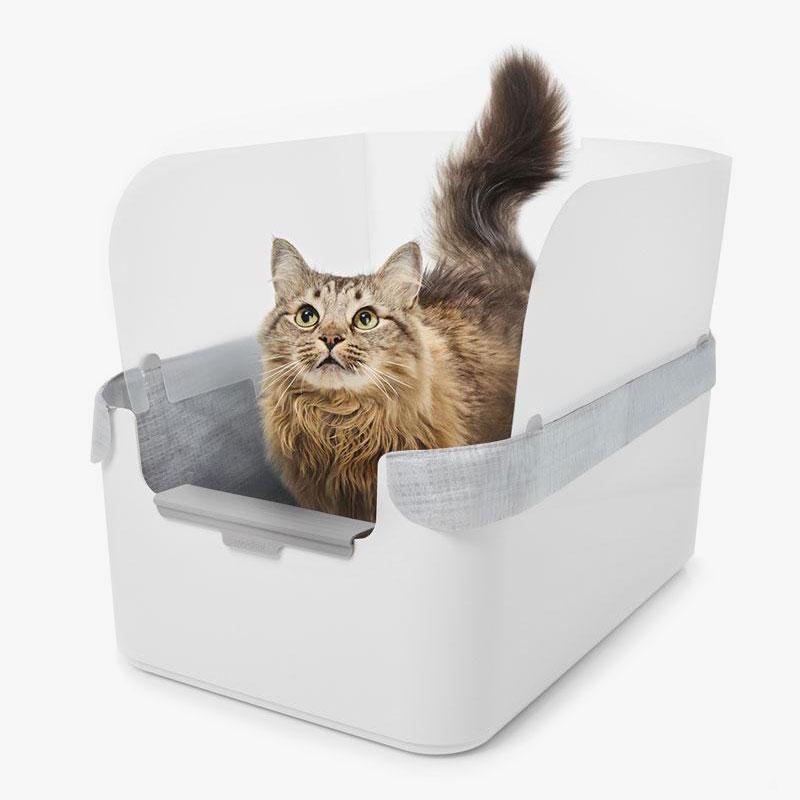 White Modkat Tray with cat looking up from inside the Tray