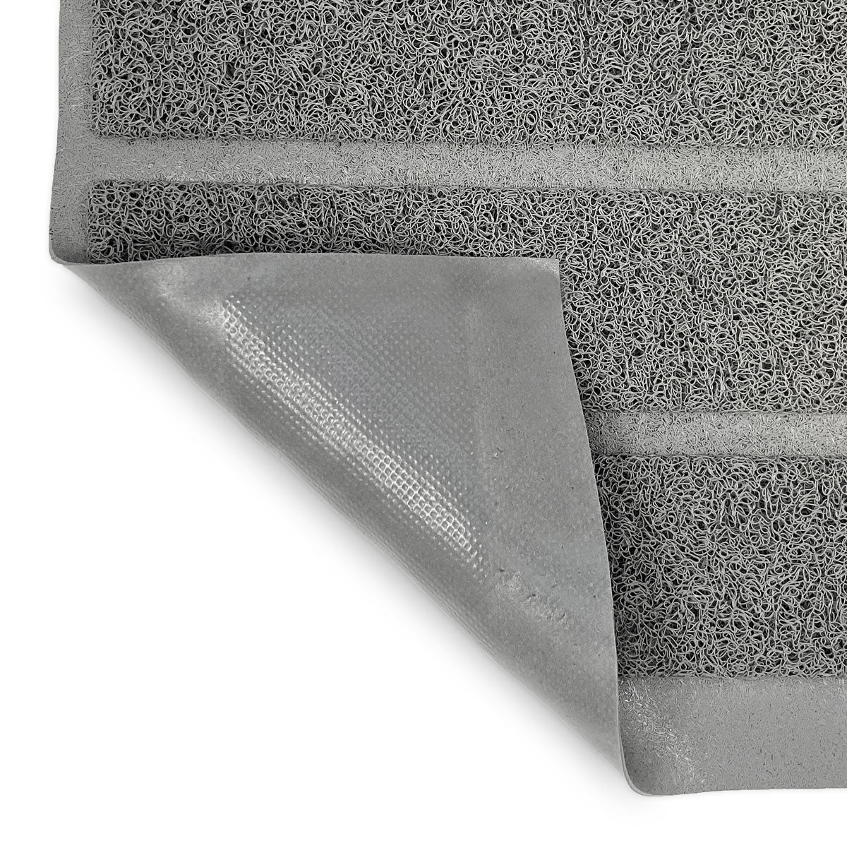 Gray litter mat detail with corner folded over showing the underside of the mat.